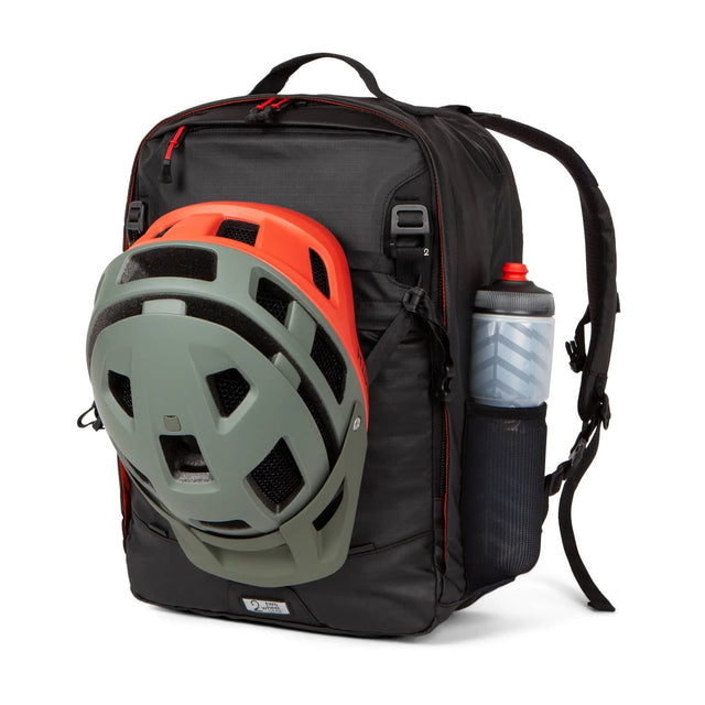 Two Wheel Gear - Alpha Pannier Backpack SMART - helmet attachment and water bottle in side pocket.